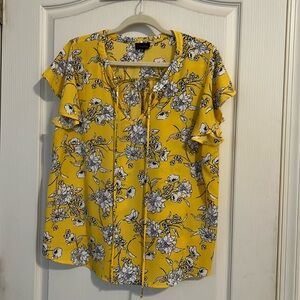 Bright airy short sleeve blouse.